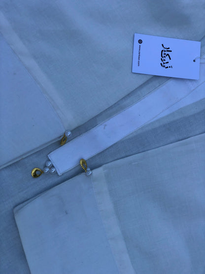 Light gray fabric with a label on a light blue background